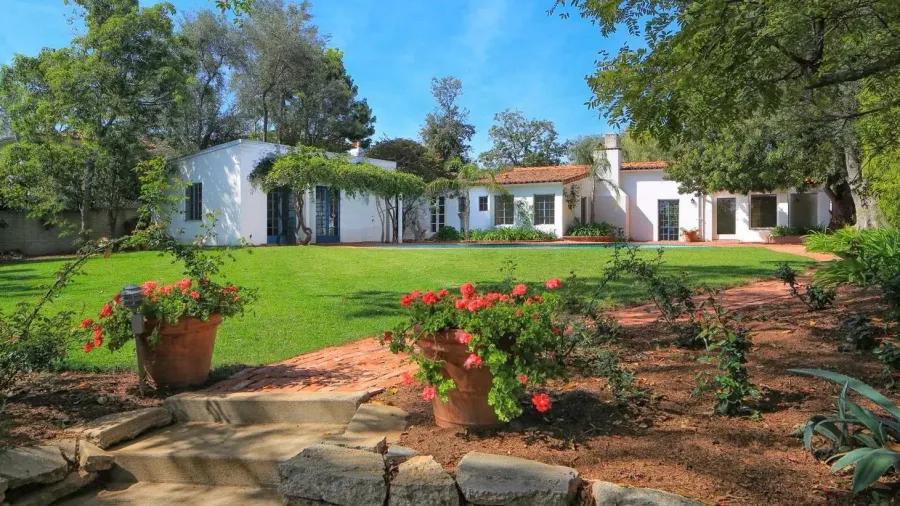 An update on the ownership mystery surrounding Marilyn Monroe's former Brentwood home — a striking 1929 Spanish house at 12305 Fifth Helena Drive with a demolition permit and a very secretive new owner.