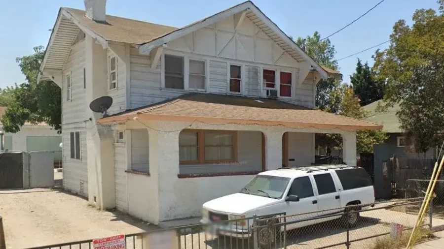 Here's a house at 1408 West 35th Street. It was built in 1907. And then some — because there's always more to the story when a century-old home lands in a developer's crosshairs.